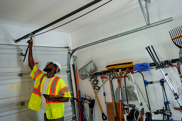 Professional Garage Door technician working in Linden, TX